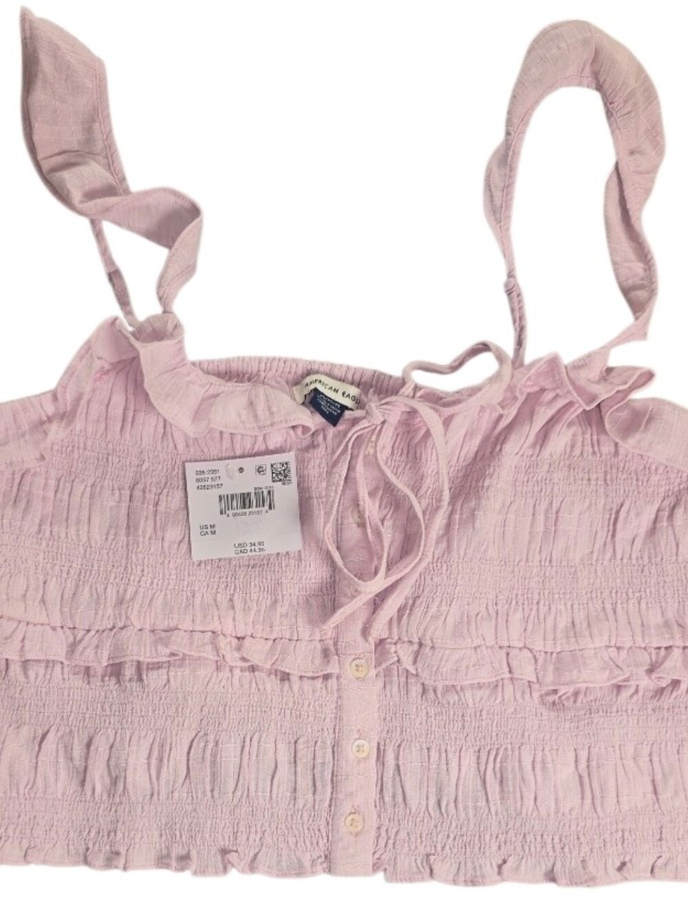 Pre-owned in excellent condition. American Eagle women’s pink smocked crop top